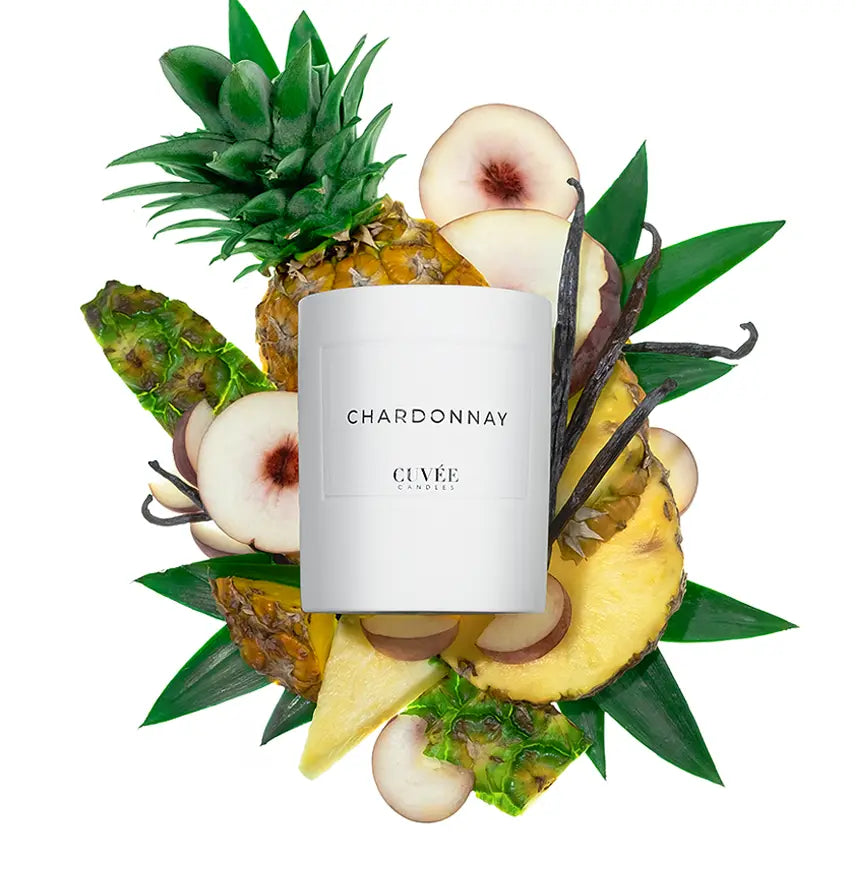 Kerze mit Früchten.